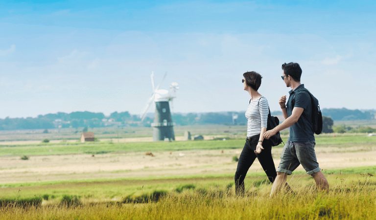 1920 900 Burgh Castle walkers Breydon Water River Waveney