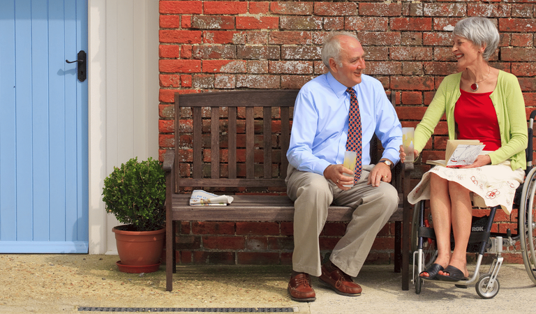 Couple in garden Accessible 1920w x 900h px